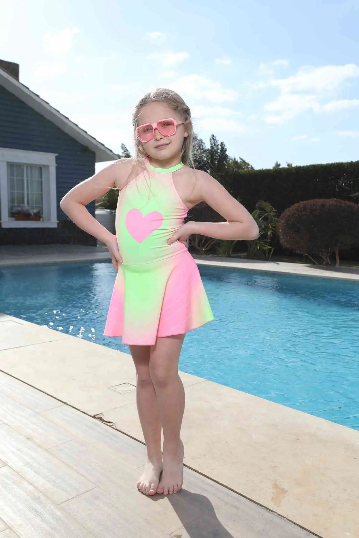 Kids' swimsuit and tiered full circle skirt for teens